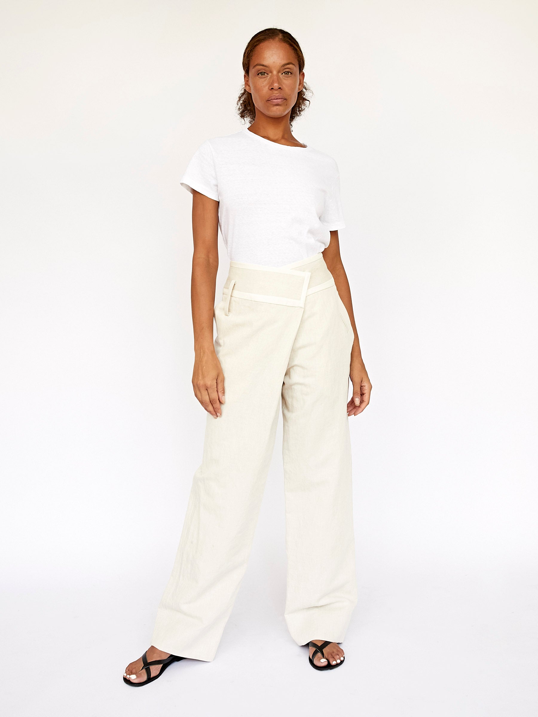 White handmade cotton trousers that fit like a dream Zippered openings  Unzippered versatility